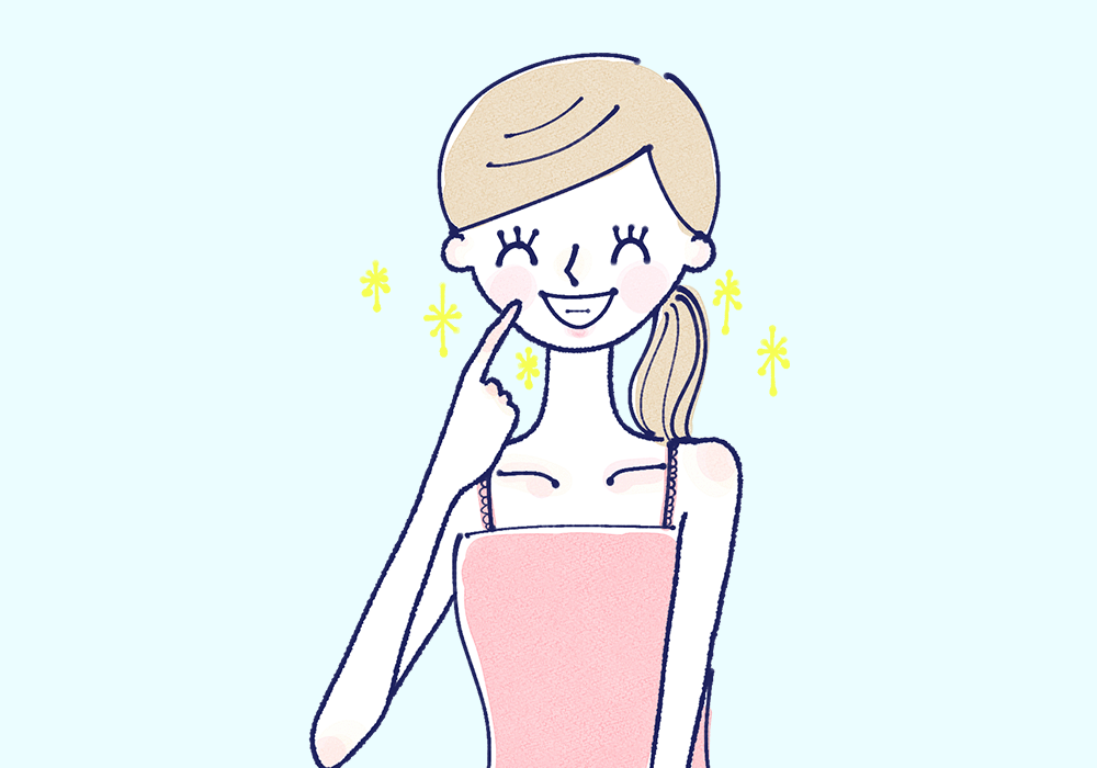 歯を指さす女性